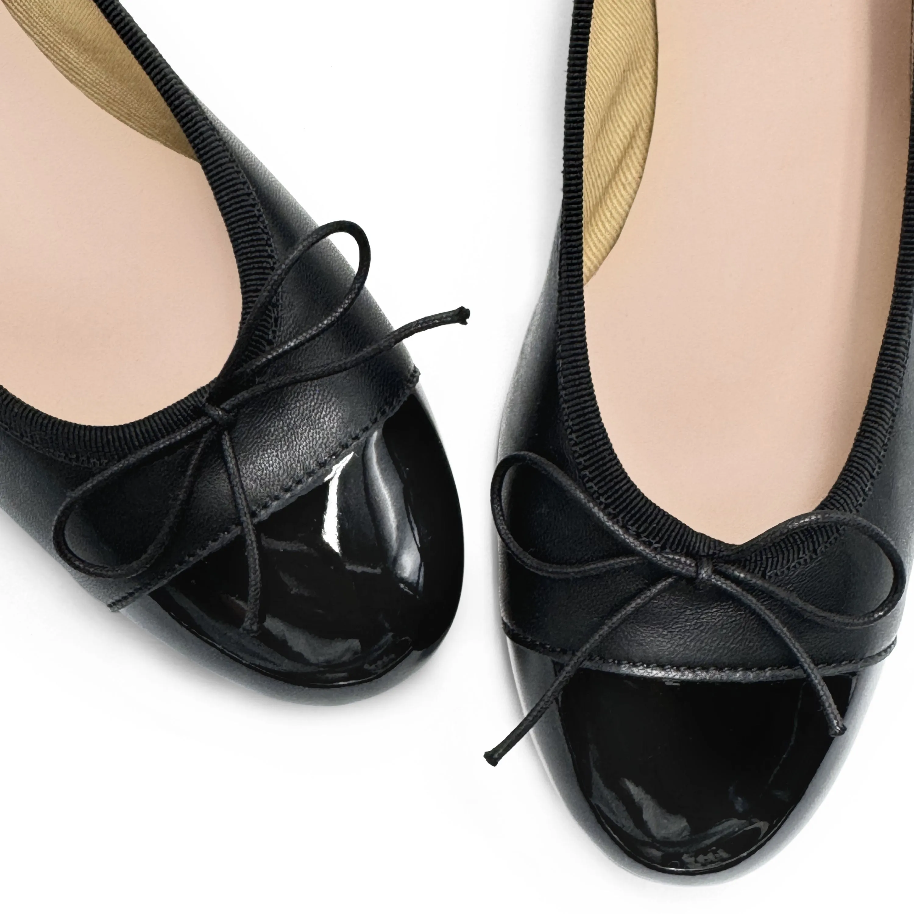 Black leather ballet flats with high heel and patent toe