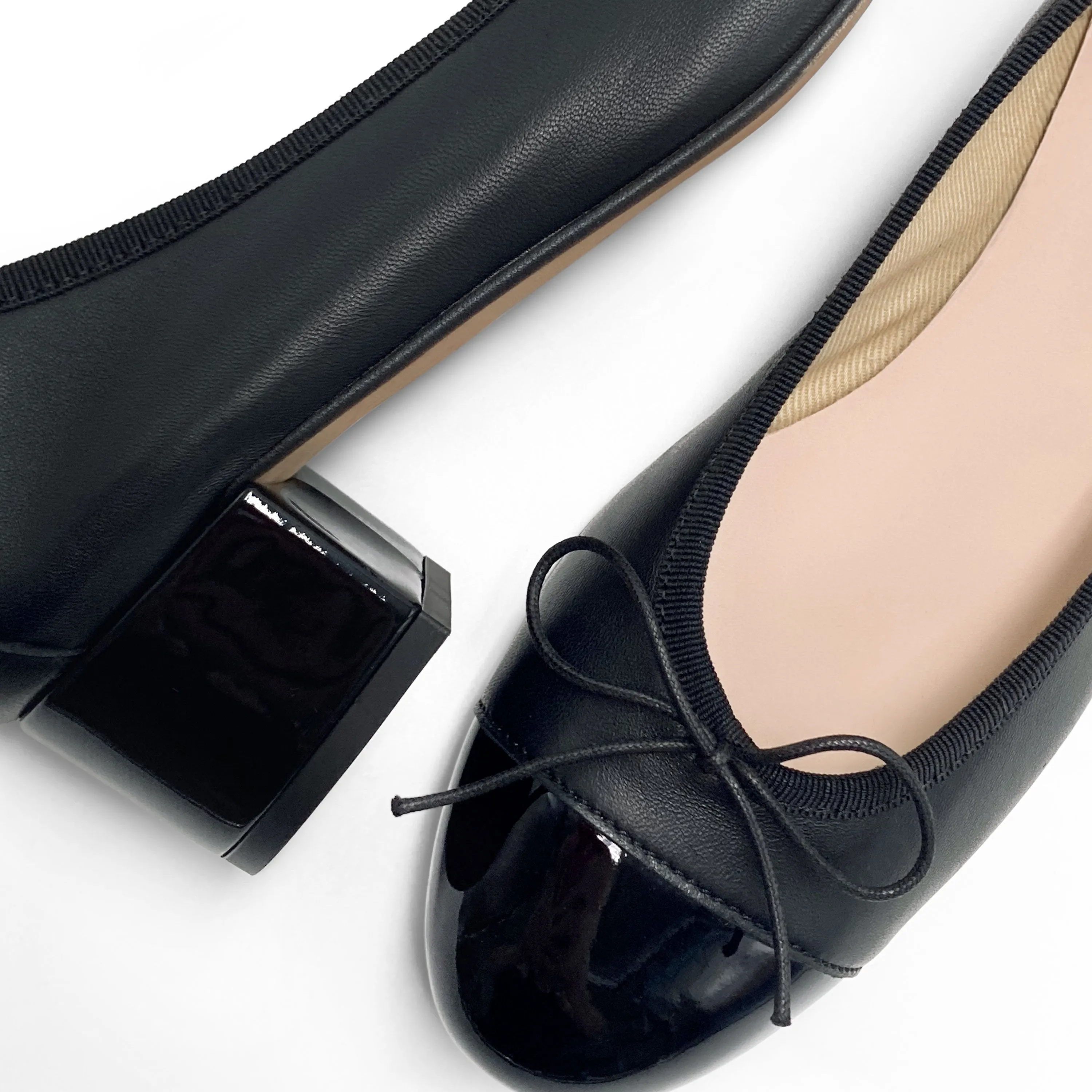 Black leather ballet flats with high heel and patent toe